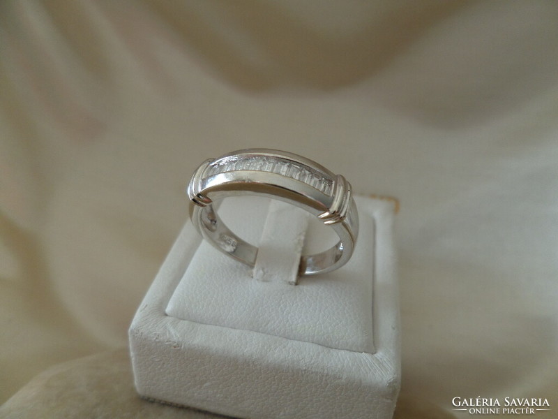 White gold ring with baguette cut bezels