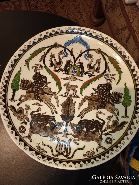Earthenware. A mythological figure, a large decorative wall plate!