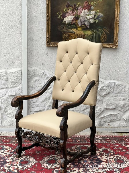 Antique renaissance style carved throne chair with new leather upholstery