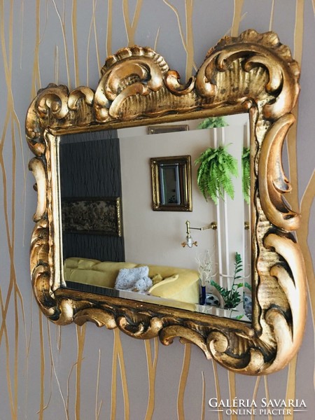 Florentine carved frame with polished mirror with original gilding