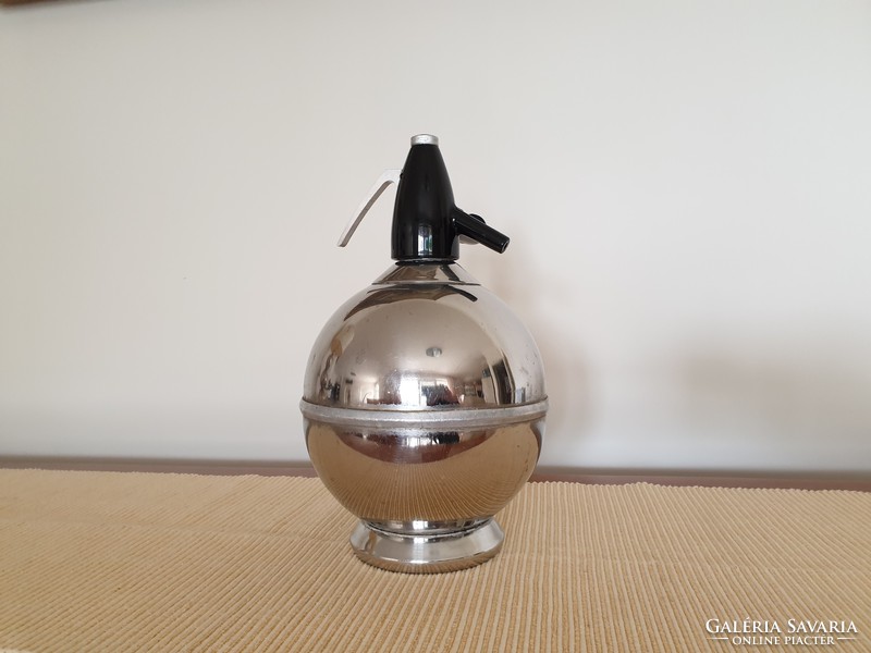 Old retro metal sphere with soda siphon