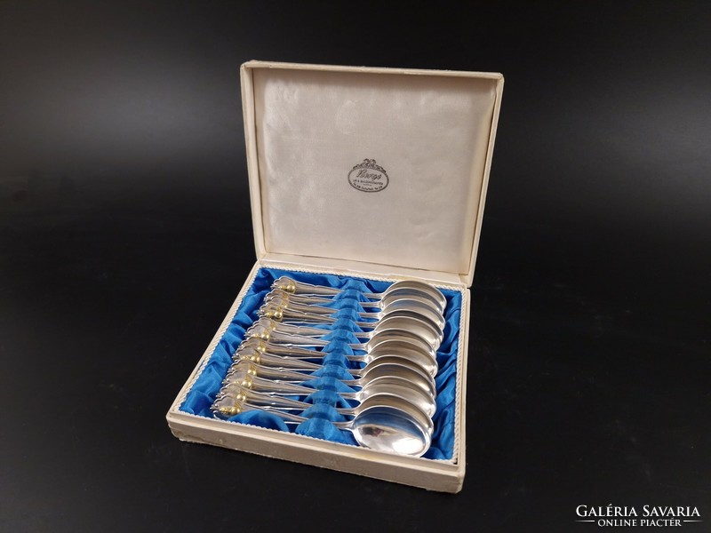 Set of 12 personal silver coffee spoons with gold decoration