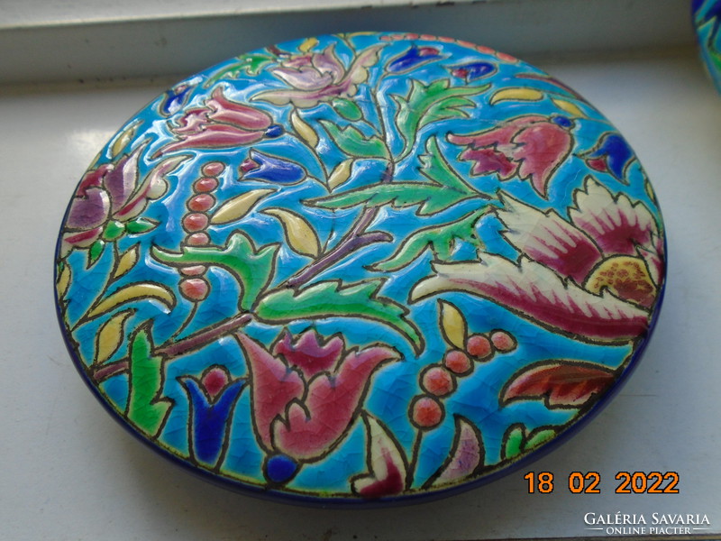 Antique longwy majolica bonbonier embossed with colorful enamel patterns on a turquoise background