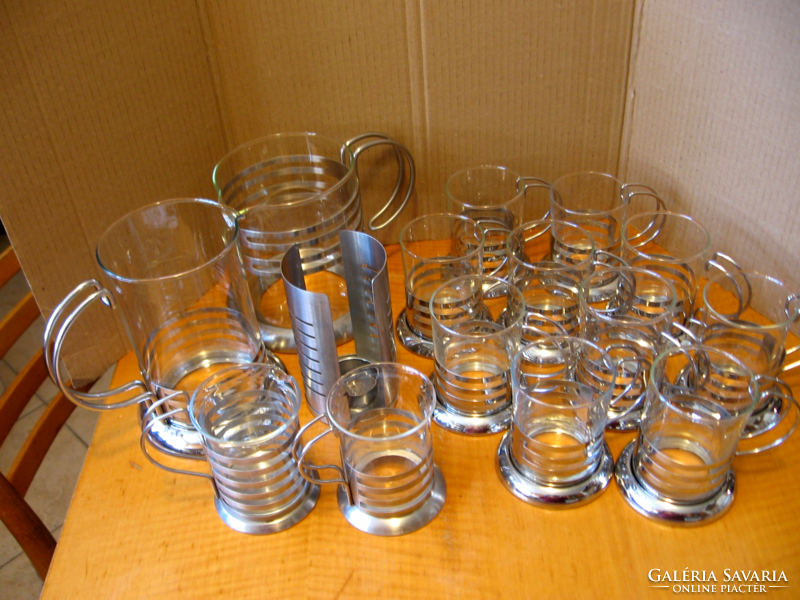 Retro glass jugs in a stainless steel striped holder