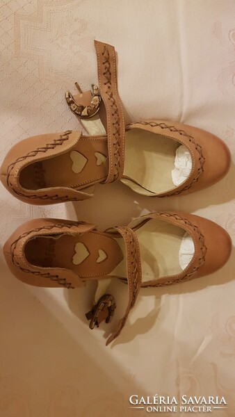 Flat shoes.. Showy ceramic (characteristic) leather with a stone buckle.