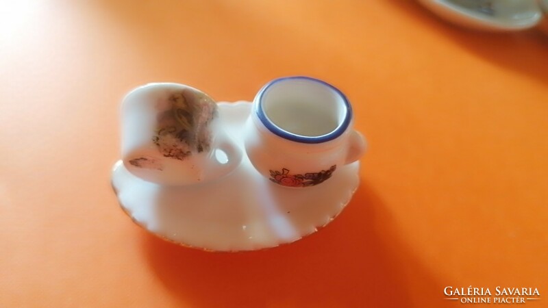 Baby porcelain for a doll house. 62.