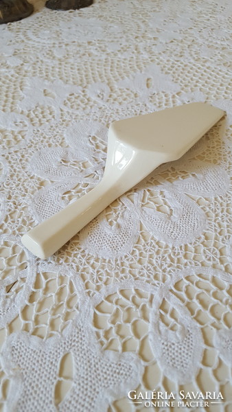 Old porcelain, earthenware cake spatula