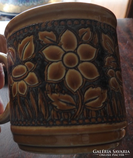 English glazed mug with lemon squeezer