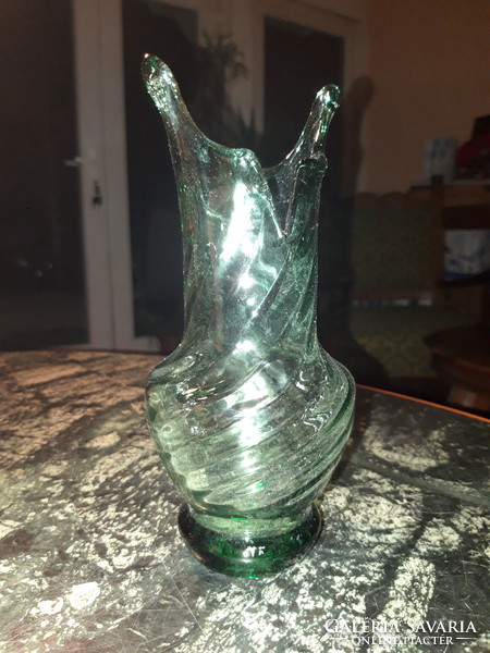 Twisted, blown, green glass vase