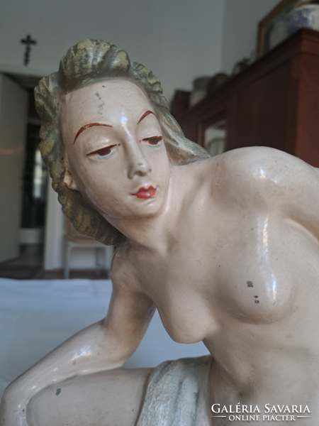 Antique ceramic nude statue