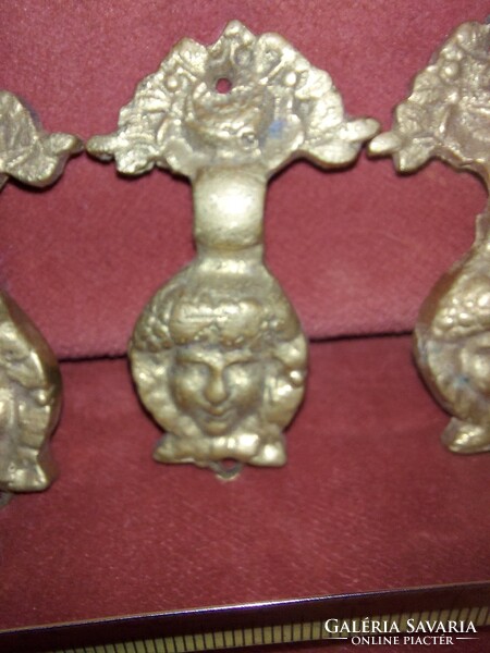 There are only 4 decorative drawer pulls/knockers, copper, the base is separate, the moving ring is separate