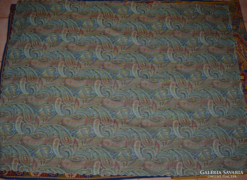 A tablecloth with a pattern woven in its material