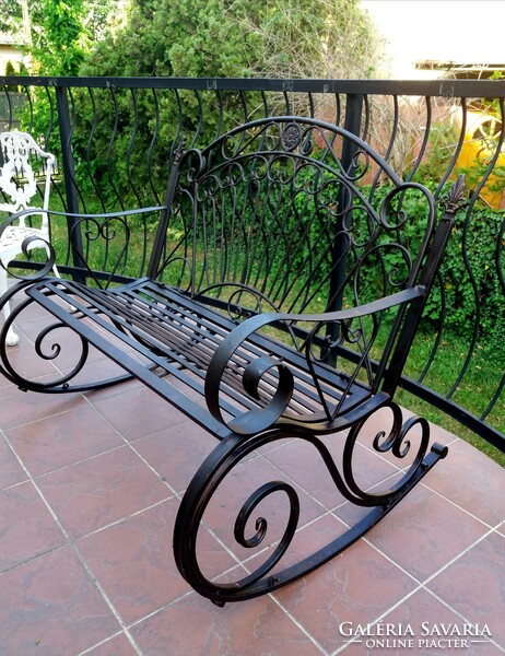 Wrought iron garden swing bench