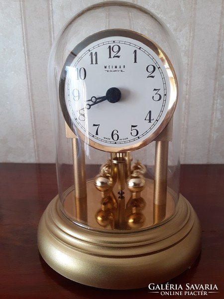Retro weimar table clock with rotating decoration