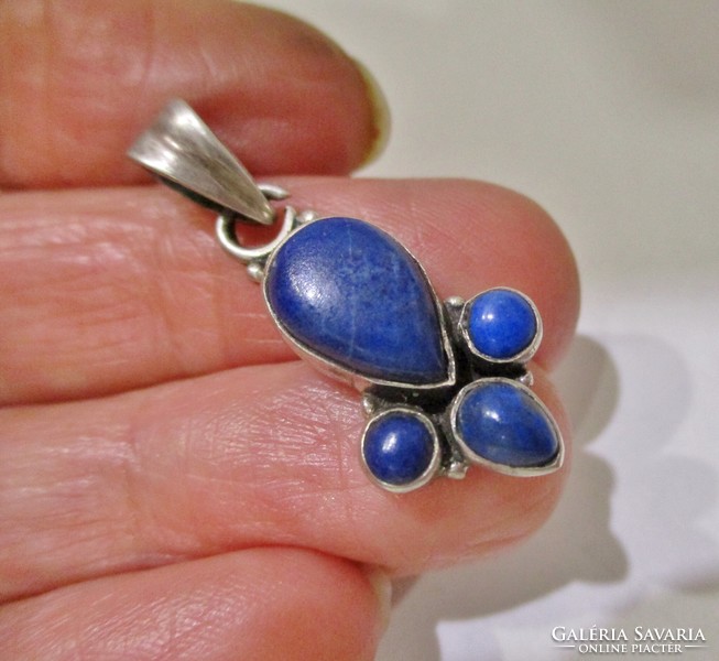 A very beautiful handcrafted silver pendant with lapis lazuli