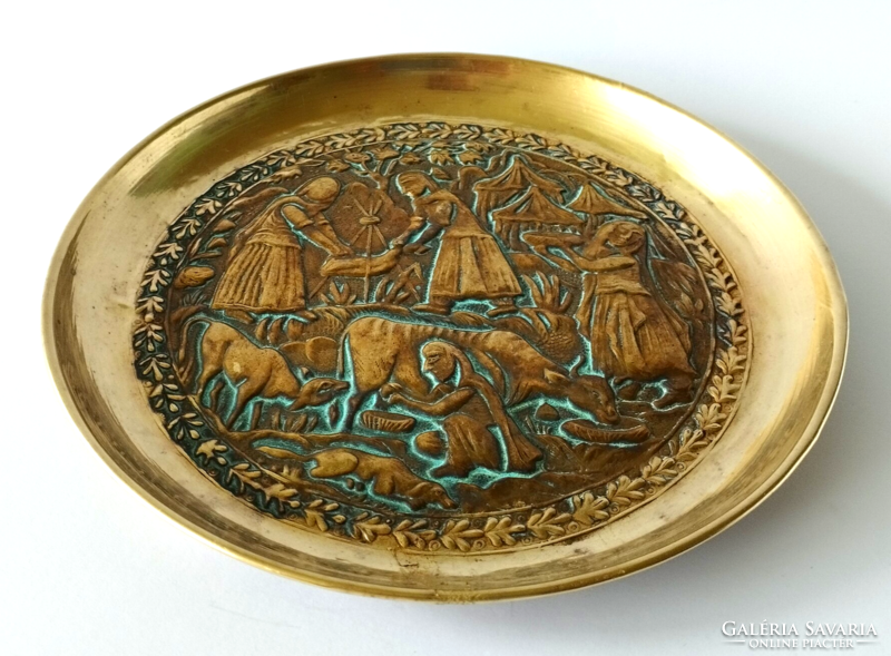 Beautiful old hand-hammered brass wall plate
