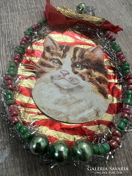 Christmas tree decoration with cats from old and new papers