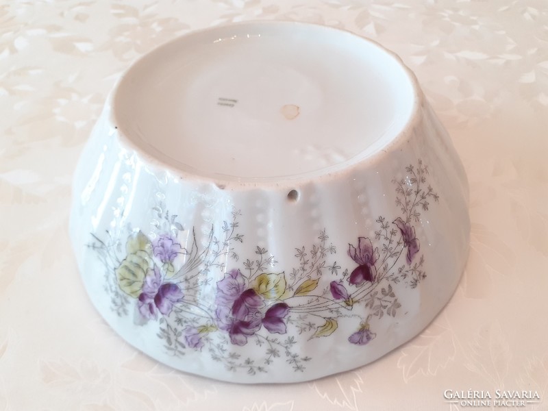 Old porcelain bowl with violet pattern, wall plate with pearls, folk wall decoration