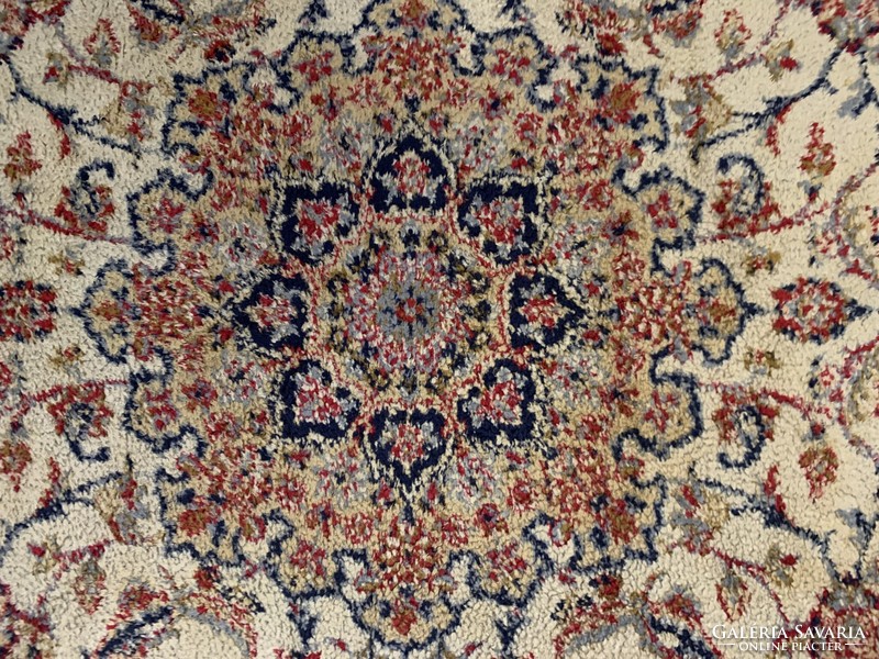Used, cleaned silk Persian carpet