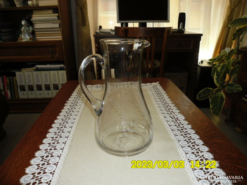 Antique polished glass jug