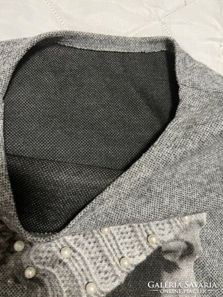 Knitted gray Italian hoodie with a cap for a woman's head