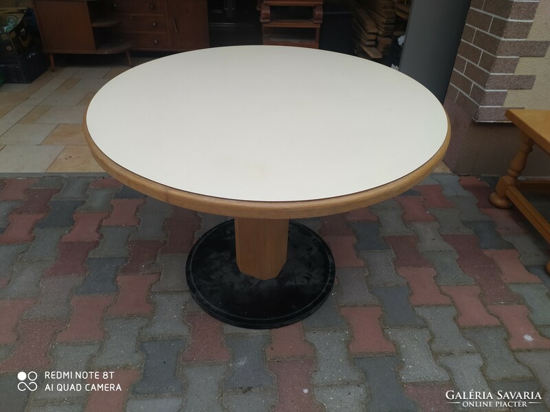 Large round table with cast iron base