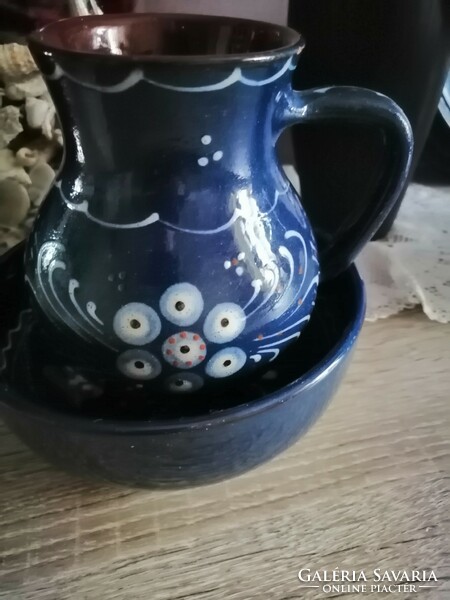 Glazed ceramic jug with plate