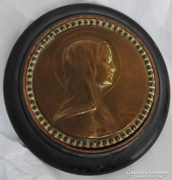 Virgin Mary bronze plaque on a wooden base