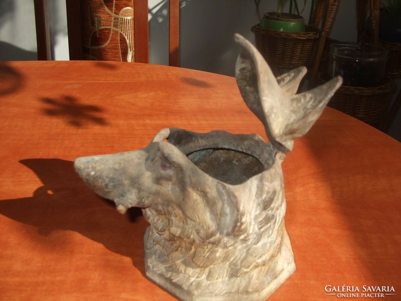 Antique wolf head with opening top