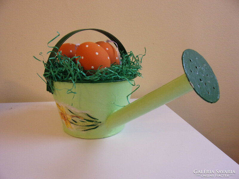 Painted tin sprinkler with blown eggs