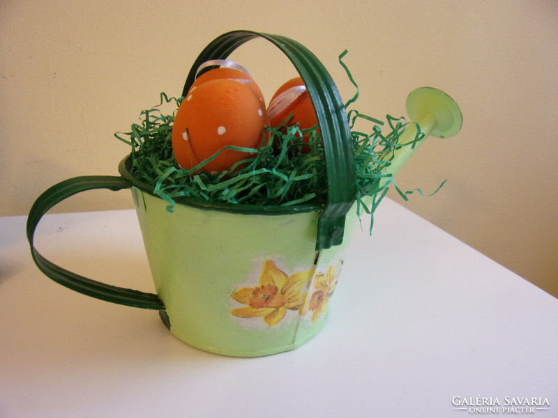 Painted tin sprinkler with blown eggs