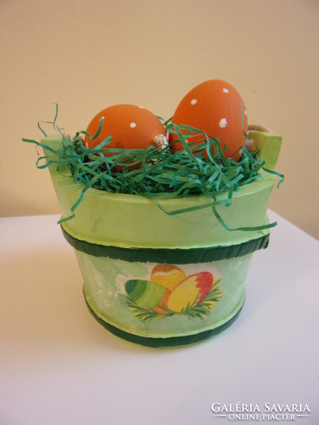 Painted wooden tub with 2 blown-out, painted eggs
