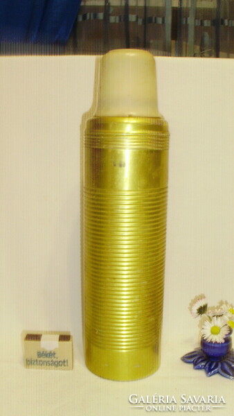 Old metal thermos with vinyl cup