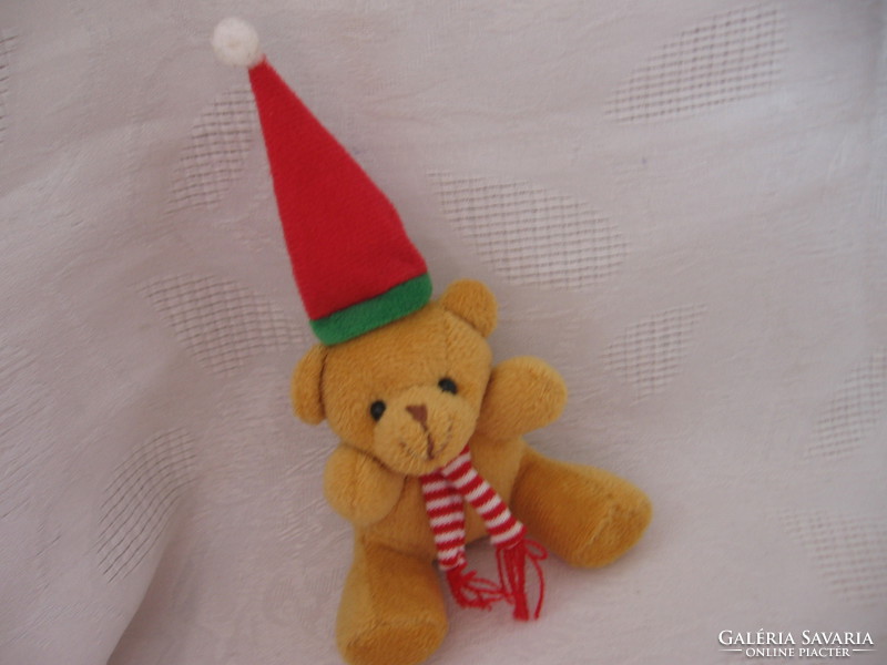 Teddy bear in Santa's cap