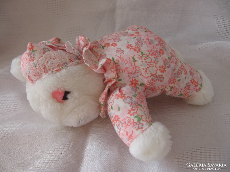 Charming sleeping teddy bear girl