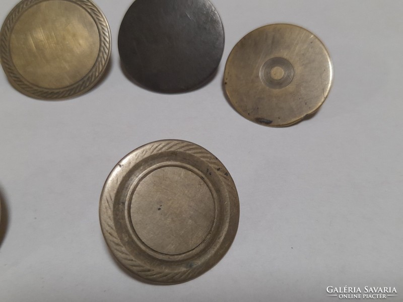 9 antique buttons together