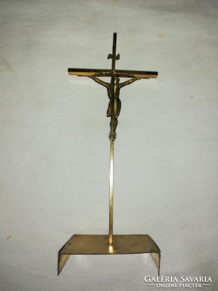 Bronze body on a brass cross