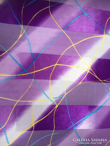 Small purple scarf with an abstract pattern