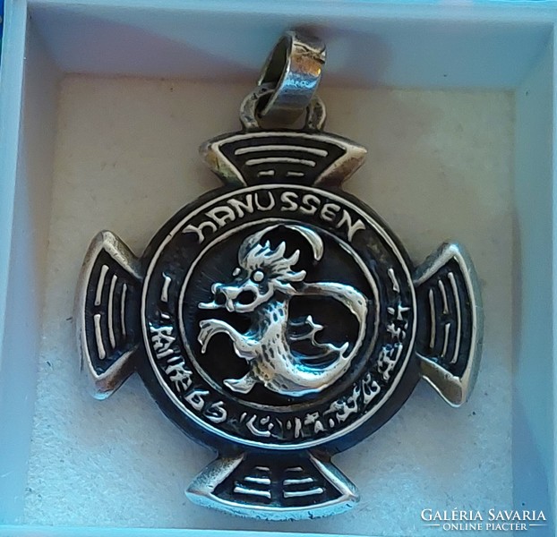 Silver dragon motif pendant