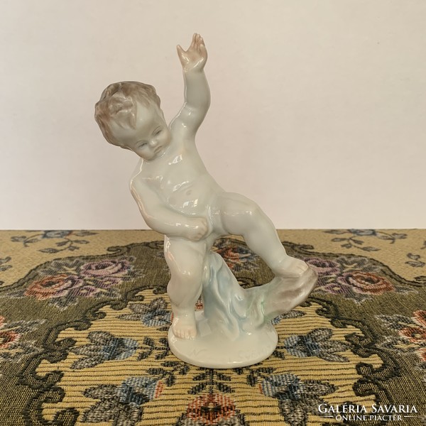 Herend's peeing putto figure is flawless