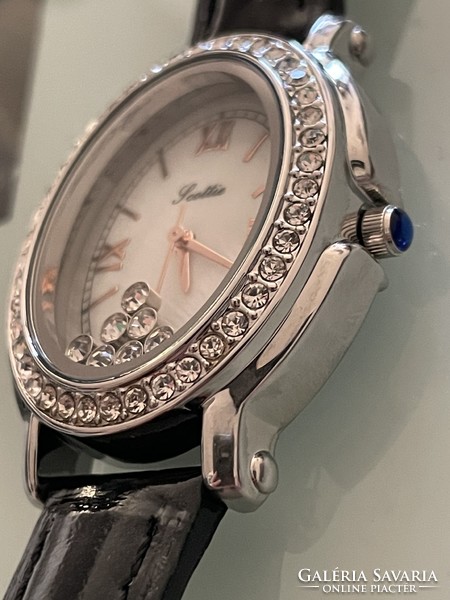 A beautiful women's jewelry watch inspired by Chopard with floating crystals