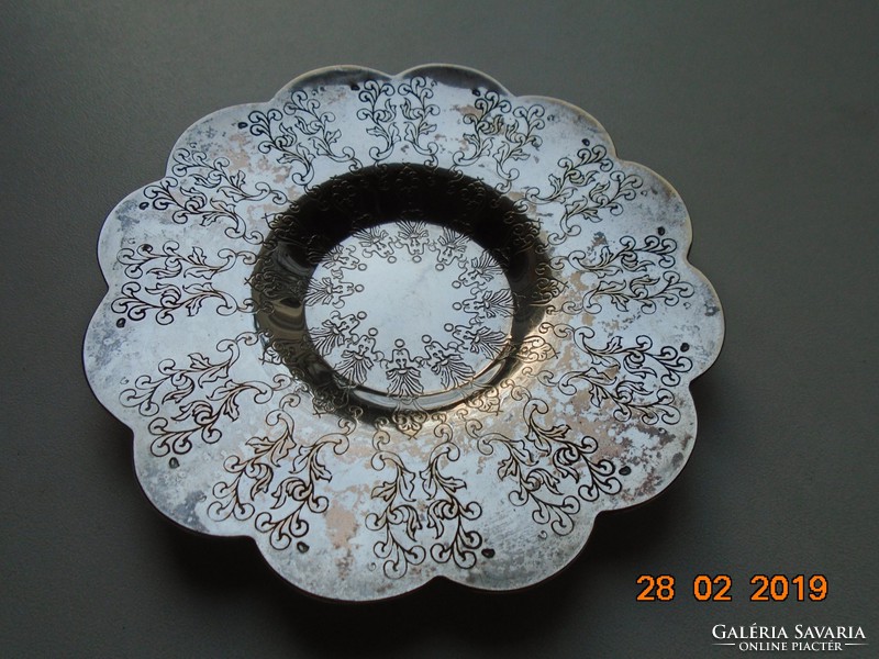 Chiseled with stylized plant patterns, wavy edge, silver-plated bowl