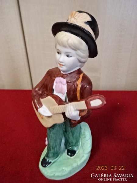 Porcelain figurine, hand-painted boy playing guitar, height 18 cm. Jokai.