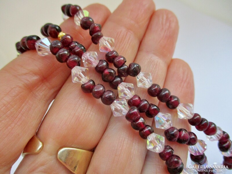 A wonderful old necklace with white and garnet-like stones