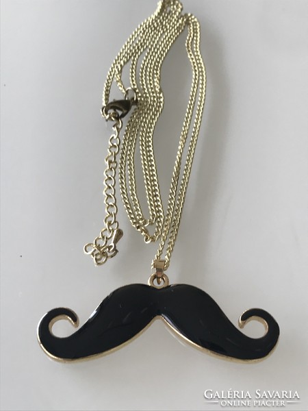 Black enamel mustache-shaped pendant on an 80 cm long chain