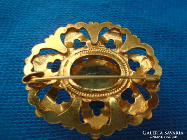 A citrine dipped in real gold, i.e. gilded? Stone original antique brooch with a beautiful large stone