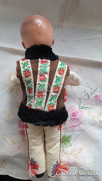 30 cm rubber boy doll in national costume