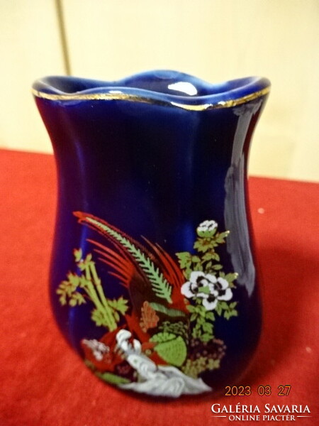 Glazed ceramic vase with a gold pheasant pattern on a cobalt blue base. Jokai.