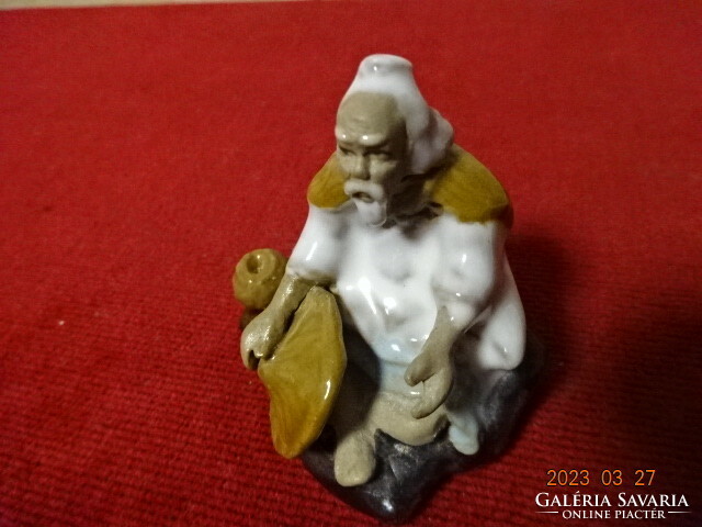 Glazed ceramic figure, old fisherman on the shore, height 6 cm. Jokai.