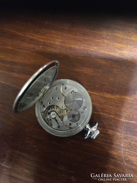 A beautiful omega pocket watch with a beautiful dial and a wonderful structure